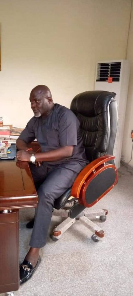 Godwin Adode in his office
